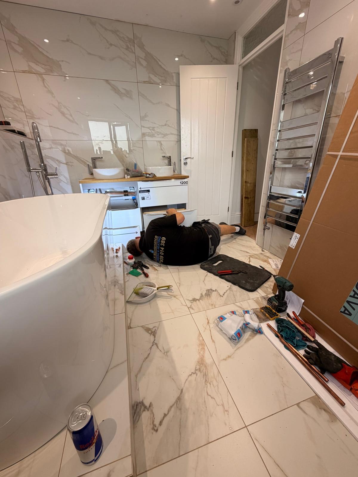 Marble-tiled bathroom part way through installation